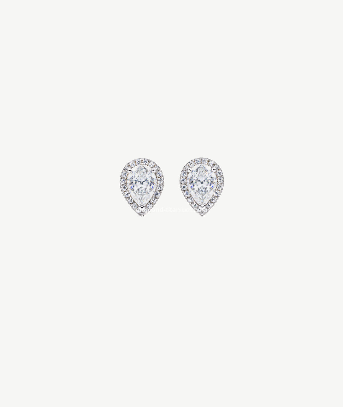 PEAR HALO SILVER EARRINGS | أقراط فضة بشكل كمثري بهالة لامعة