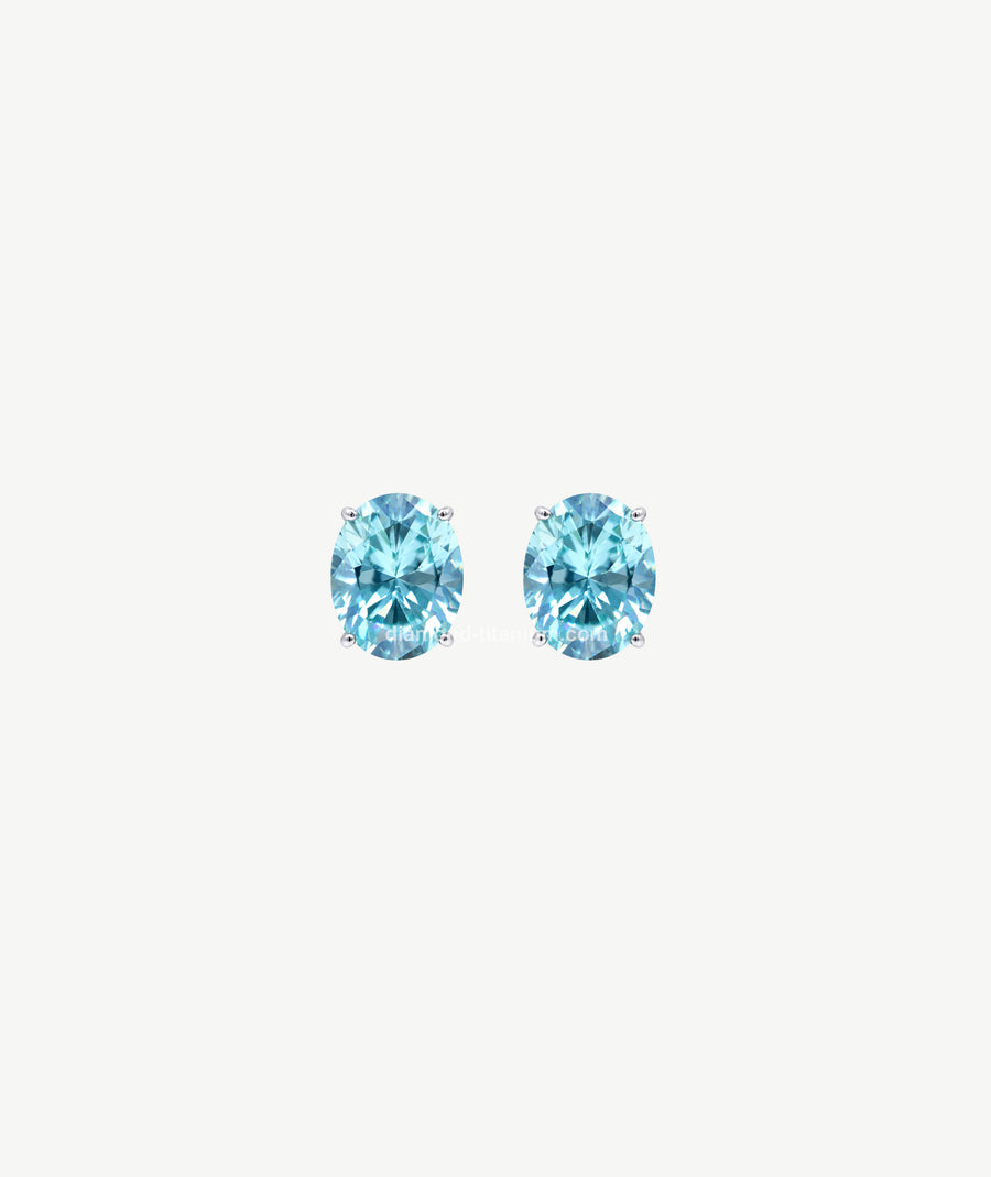 LIGHT BLUE OVAL SILVER EARRINGS | أقراط فضة بحجر أزرق فاتح بيضاوي
