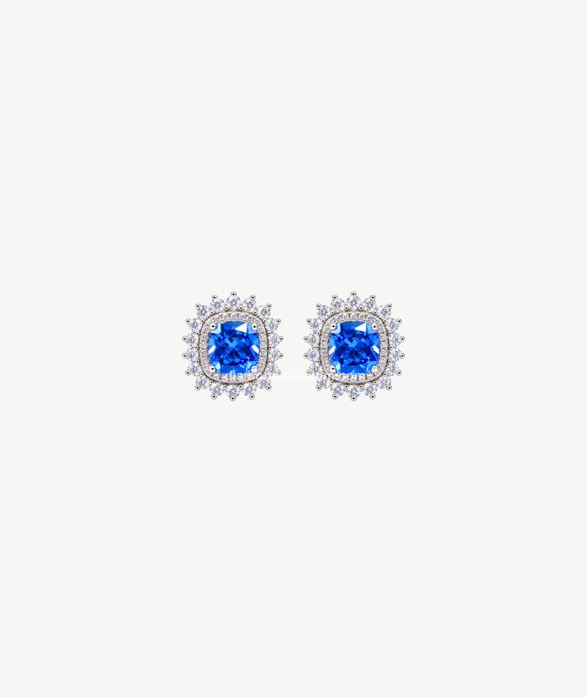 BLUE CUSHION HALO SILVER EARRINGS | أقراط فضة بحجر أزرق كوشن