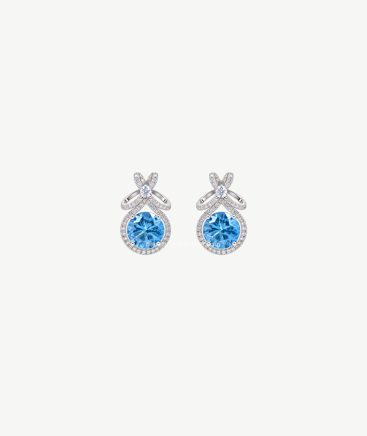 BLUE BOW SILVER EARRINGS | أقراط فضة بتصميم فيونكة وحجر أزرق
