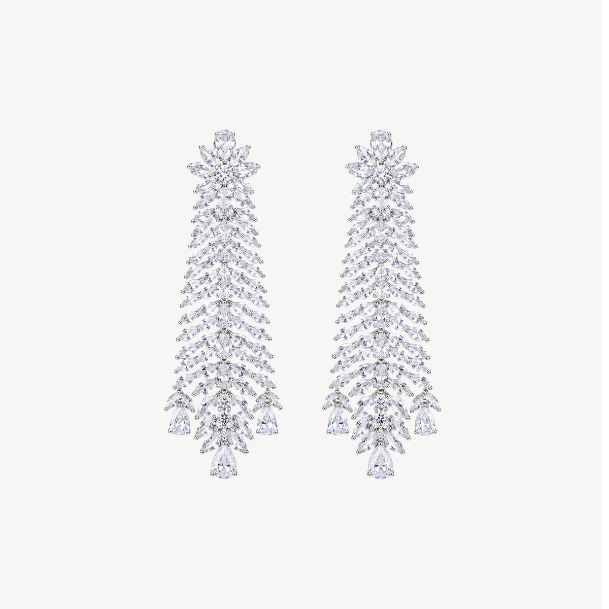 WHITE CASCADE SILVER EARRINGS | أقراط فضة بيضاء بتصميم متدلٍ