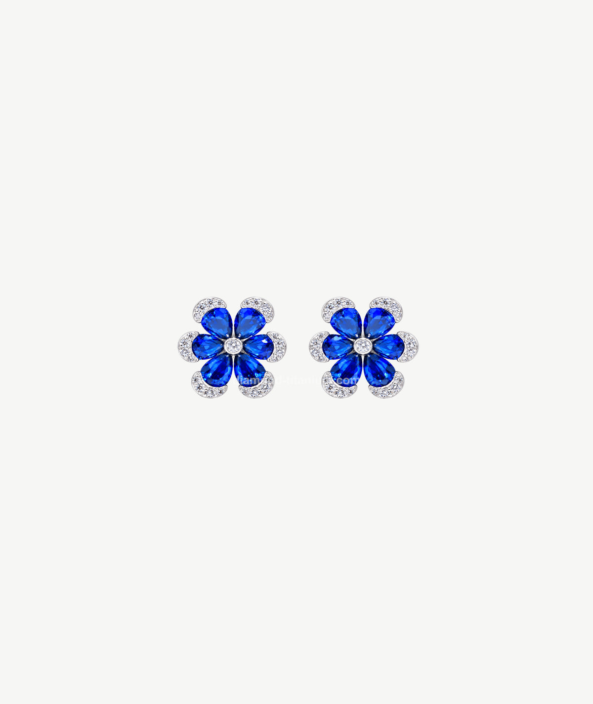 BLUE FLOWER SILVER EARRINGS | أقراط فضة بتصميم زهرة زرقاء