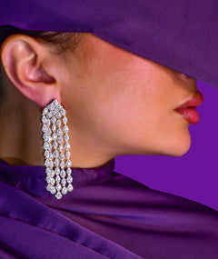 WHITE TEARDROP SILVER EARRINGS | أقراط فضة متدلية بأحجار بيضاء
